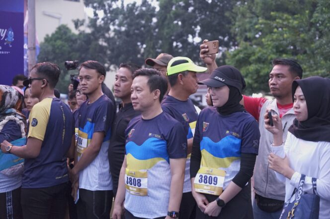 
Pj Bupati Pringsewu Marindo Ikuti Water Day Run Lampung